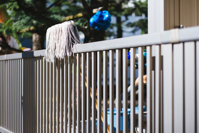 Mop on fence