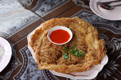 High angle view of omelet served in plate on table