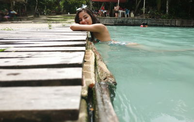 Portrait of woman in swimming pool