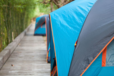 Close-up of tent on footpath