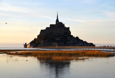 View of historical building against sky during sunset