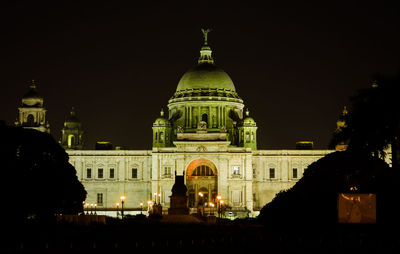 Illuminated building at night