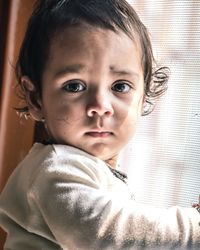 Portrait of boy at home