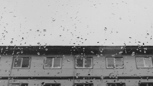 Full frame shot of wet window in rainy season