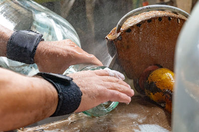 Close-up of man holding ice cream