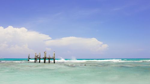 Scenic view of beach against sky