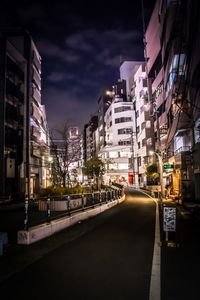 Illuminated buildings in city at night