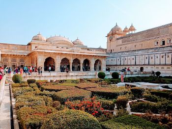 Group of people in front of historical building