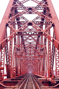 Low angle view of railway bridge against sky