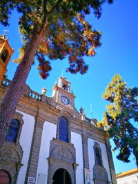 Low angle view of cathedral against clear blue sky