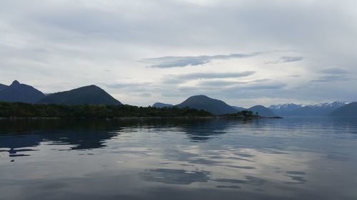 View of lake against cloudy sky