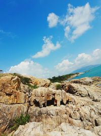 Scenic view of landscape against blue sky