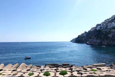 Scenic view of sea against clear sky