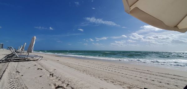 Scenic view of beach against sky