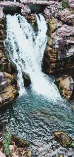 Scenic view of waterfall in forest