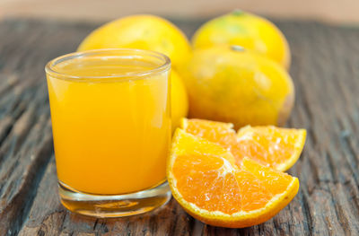 Close-up of yellow drink on table