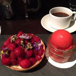 Close up of coffee served on table