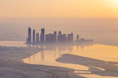 United arab emirates, dubai, view of dubai creek at foggy sunrise