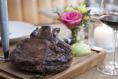 Close-up of steak on table in restaurant