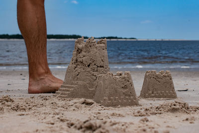 Low section of man on beach