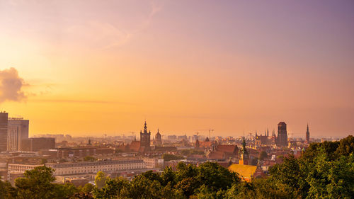 View of buildings against sky during sunset