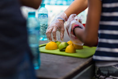 Close-up of hand holding fruits