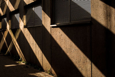 High angle view of sunlight falling on staircase of building