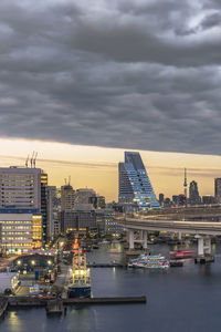 Circular highway leading to the rainbow bridge in odaiba bay of tokyo.