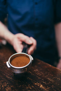 Close-up of coffee cup on table