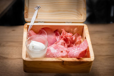 High angle view of bread in container on table