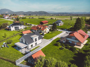 High angle view of houses on field