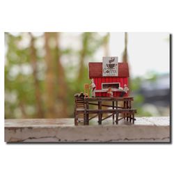 Close-up of red wood against sky