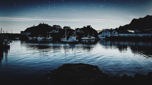 Reflection of illuminated buildings in water