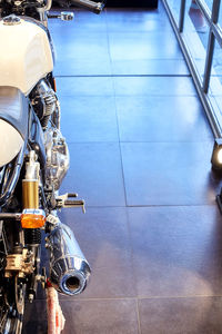 High angle view of bicycle on tiled floor