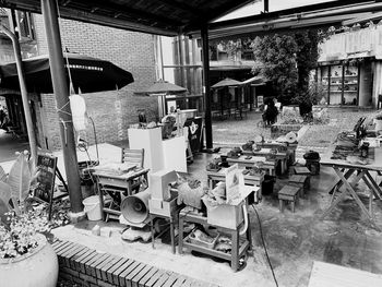 Group of people at market stall building