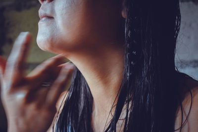 Close-up portrait of young woman