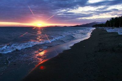 Scenic view of sea at sunset