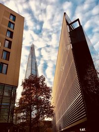 Low angle view of skyscrapers against sky