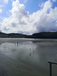 Scenic view of beach against sky