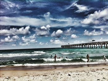 Scenic view of sea against cloudy sky