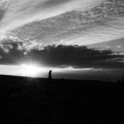 Scenic view of landscape against sky during sunset