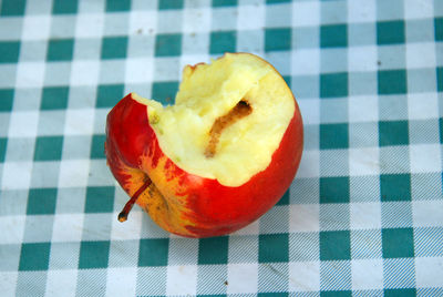 Close-up of apple core on table
