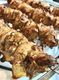 Close-up of meat on barbecue grill
