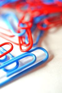 Close-up of eyeglasses on blue fabric