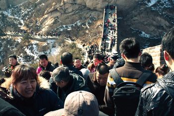 PEOPLE LOOKING AT VIEW OF MOUNTAIN