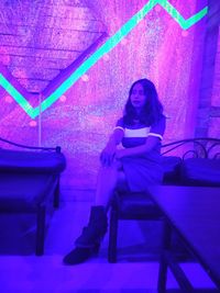 Woman sitting on chair