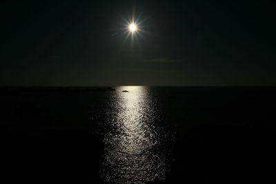 Scenic view of sea against sky at sunset