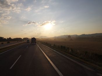 Road against sky during sunset