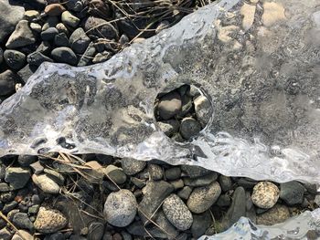 High angle view of stones on beach