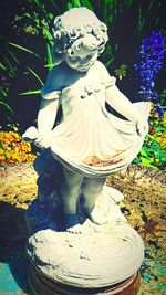 Close-up of buddha statue in yard